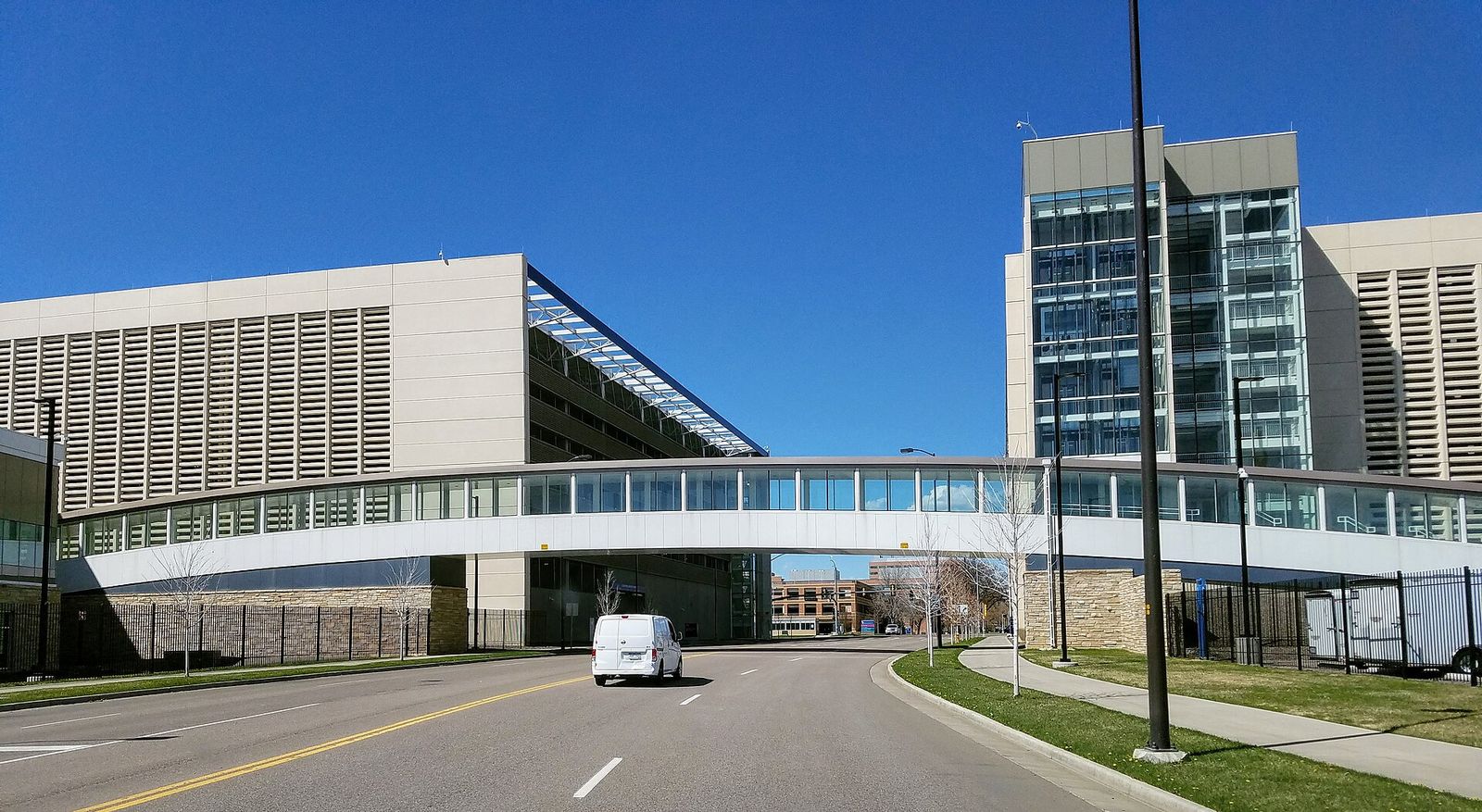 Glass pedestrian bridge connecting buildings at the Rocky Mountain Regional VA Medical Center in Aurora