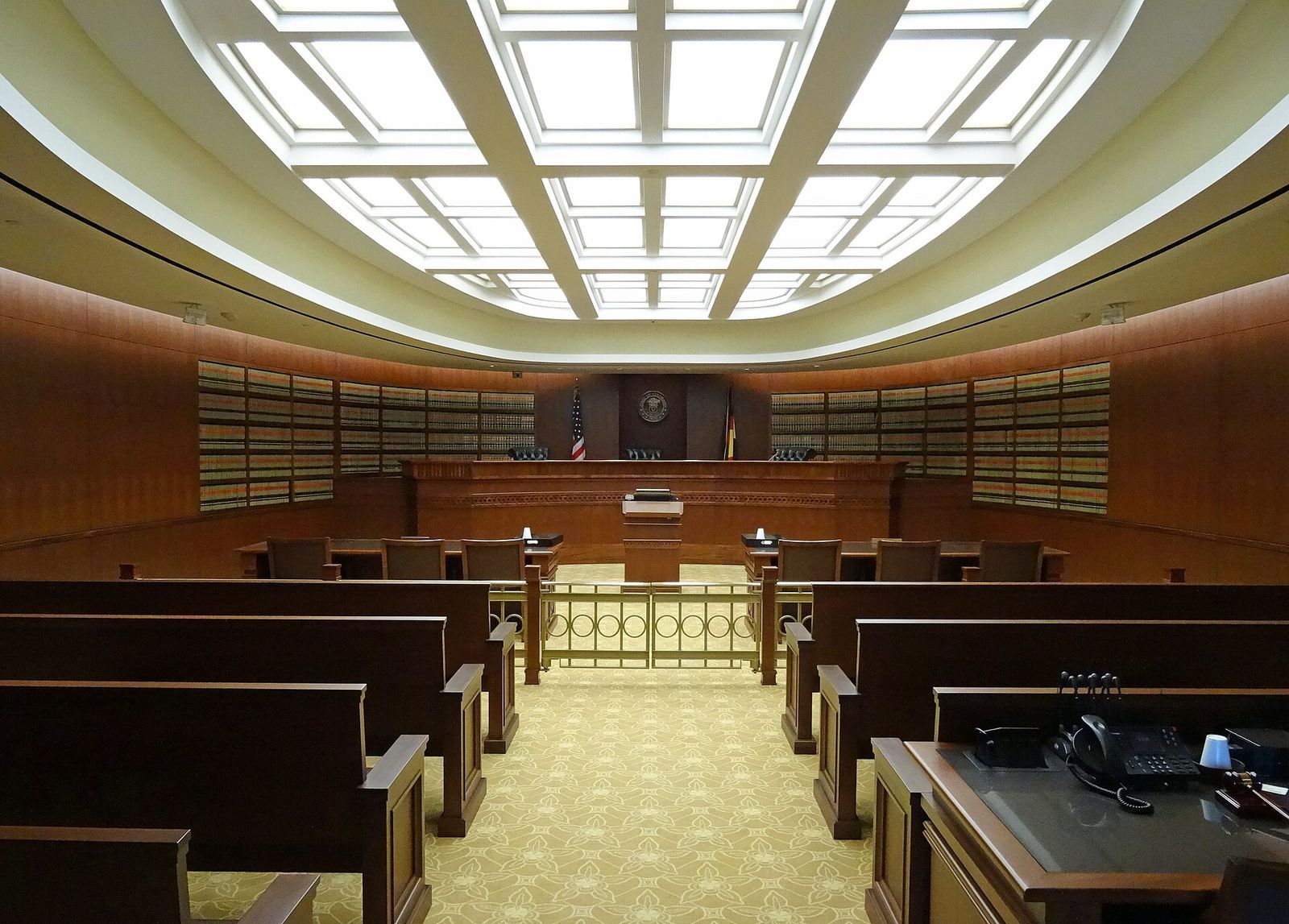 Colorado Court of Appeals courtroom with wooden benches under a skylit ceiling
