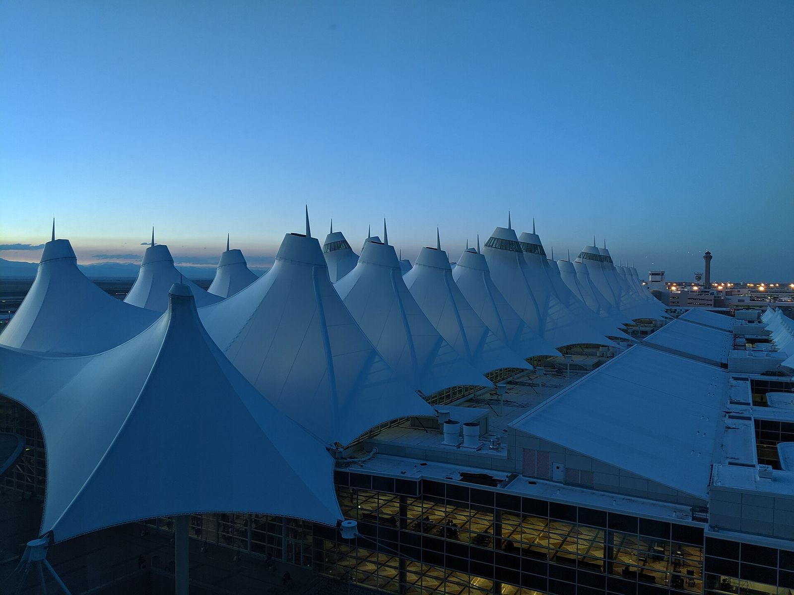 The white peaked tent roof of Denver International Airport's Jeppesen Terminal