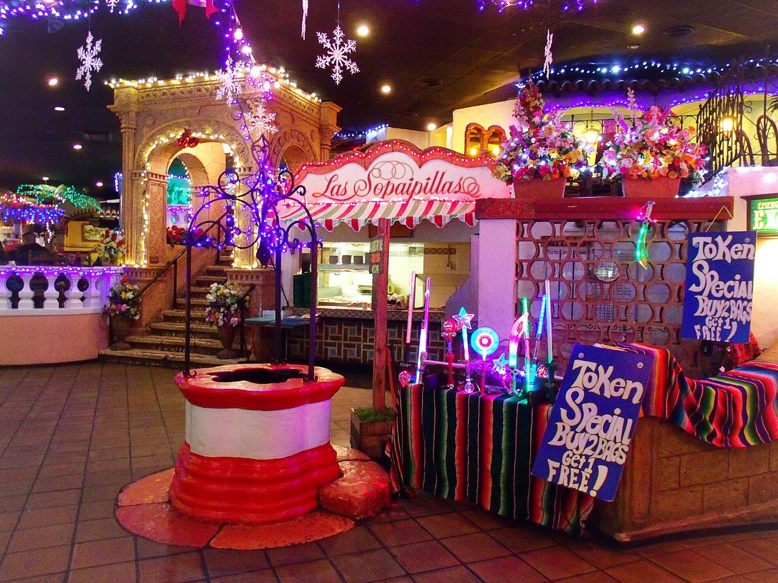 Colorful interior of Casa Bonita restaurant in Lakewood with lights and decorations