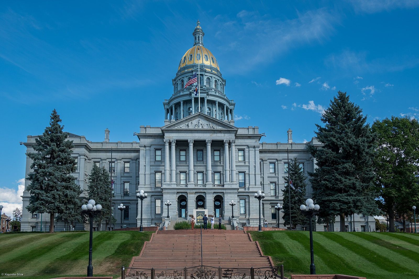 Colorado State Capitol in Denver with its gold dome above the west lawn