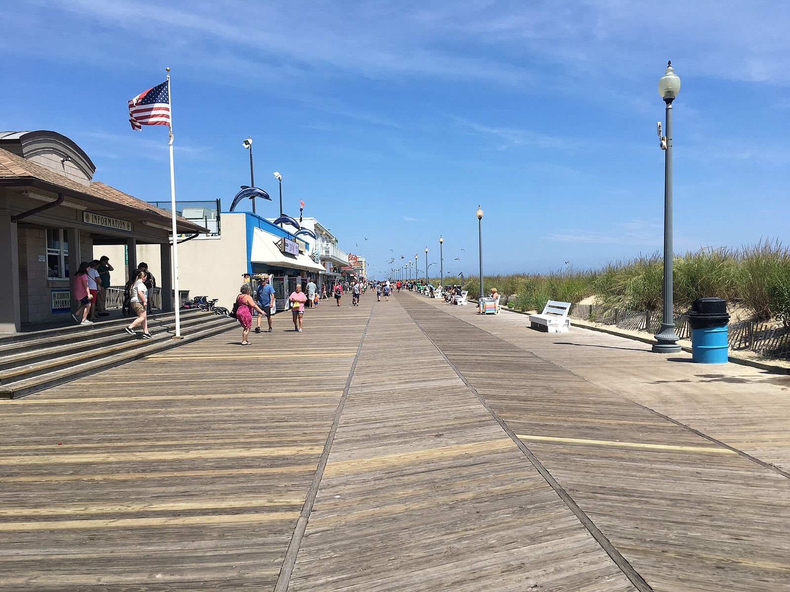 Wooden boardwalk at Rehoboth Beach stretching along the dunes on a sunny day