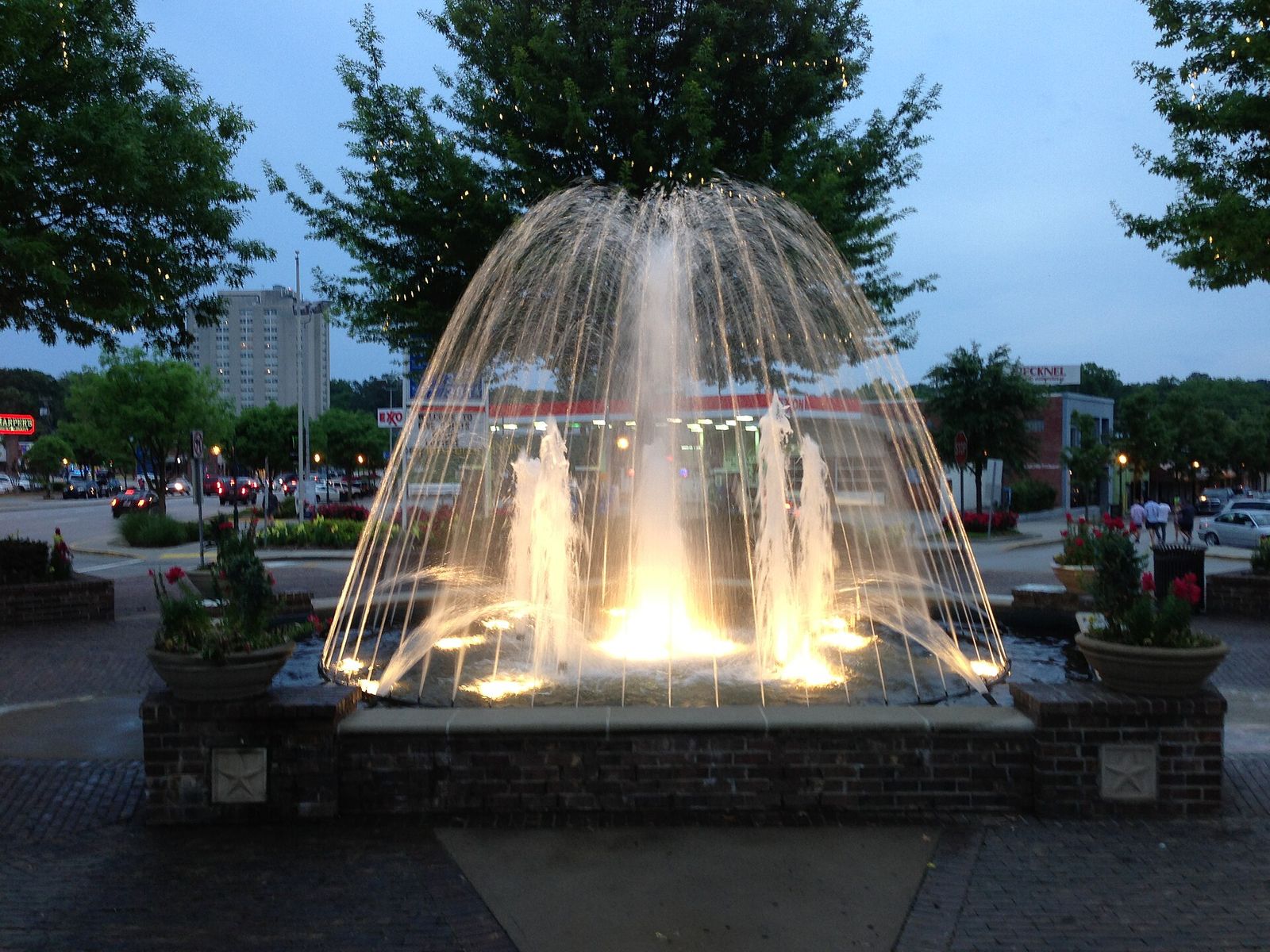 Lit fountain in the Five Points district of Columbia at dusk