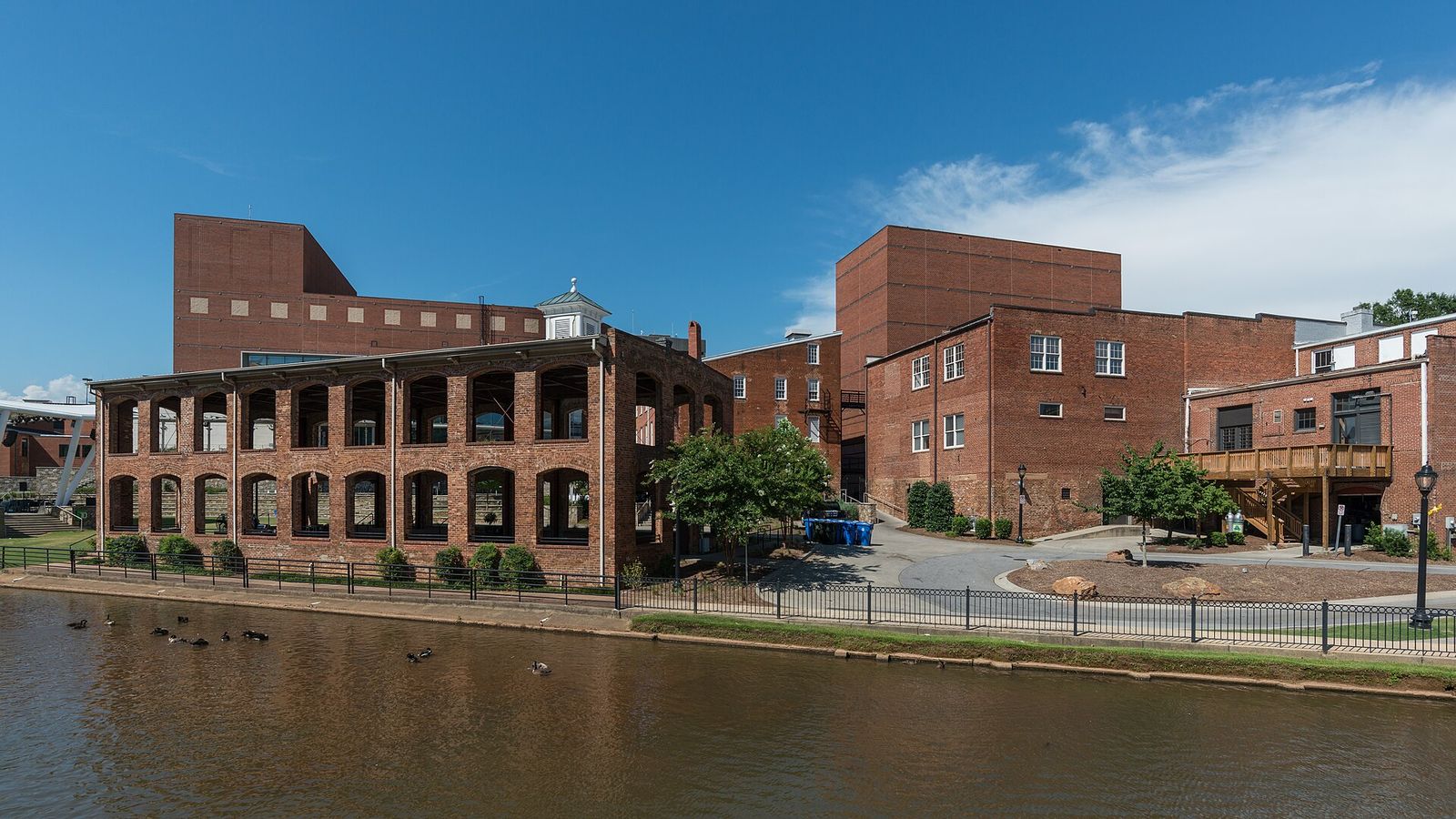 Peace Center performing arts buildings beside the Reedy River in Greenville