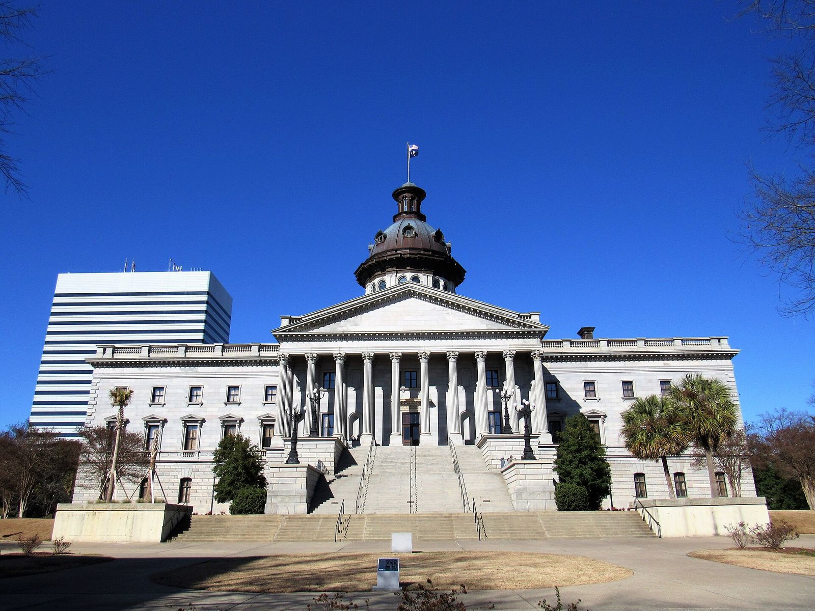 South Carolina State House in Columbia with its copper dome and palmetto trees