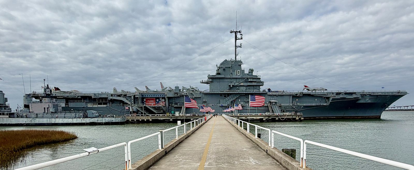 Long pier leading to the aircraft carrier Yorktown at Patriots Point