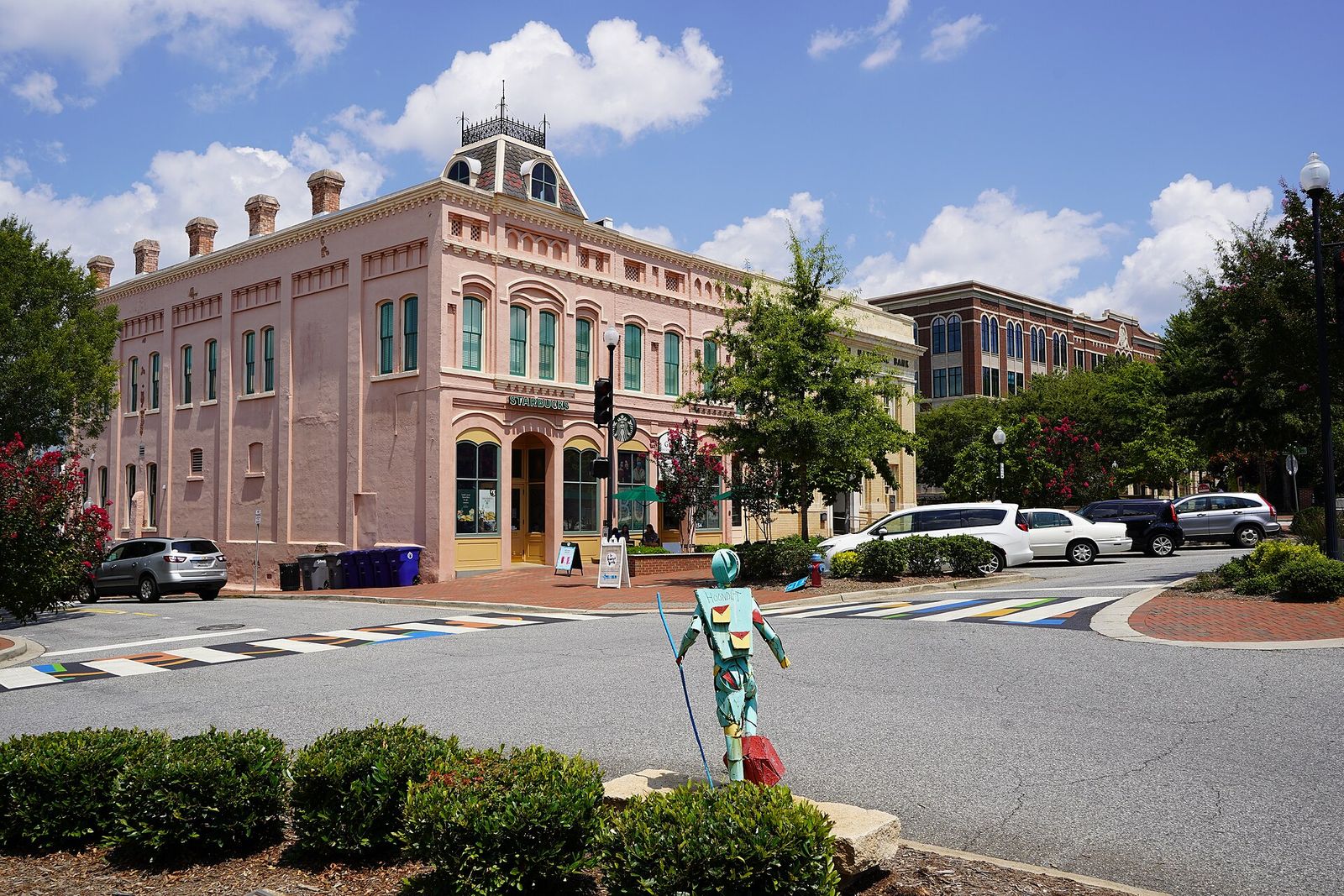 Pink historic building and a quiet intersection on Main Street in downtown Spartanburg