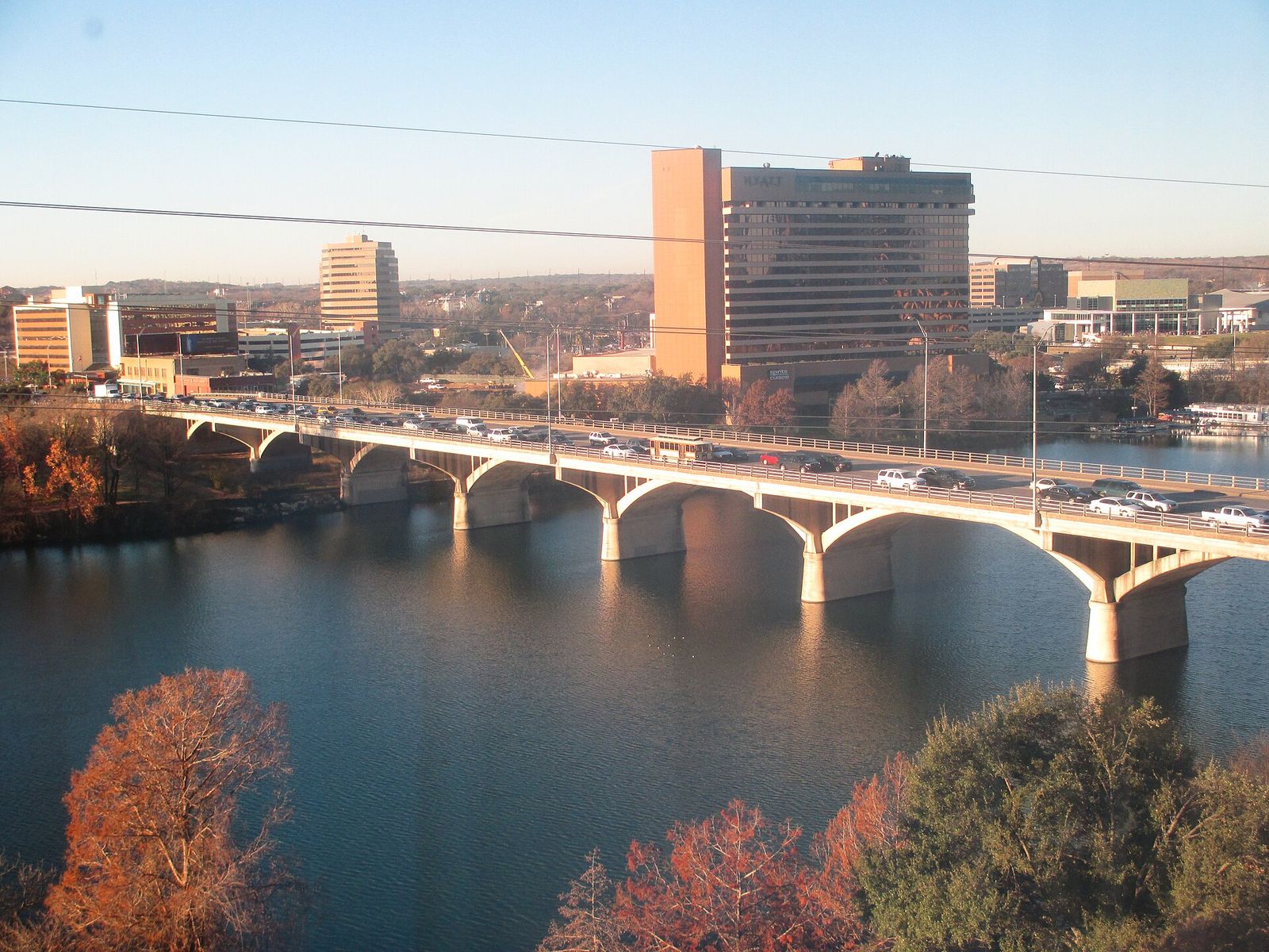 Congress Avenue Bridge spanning Lady Bird Lake with downtown Austin buildings behind it