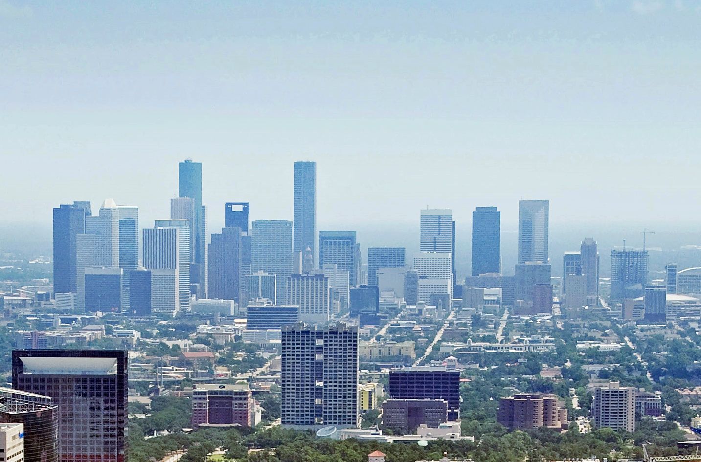 Aerial view of the Texas Medical Center with downtown Houston's skyline in the distance