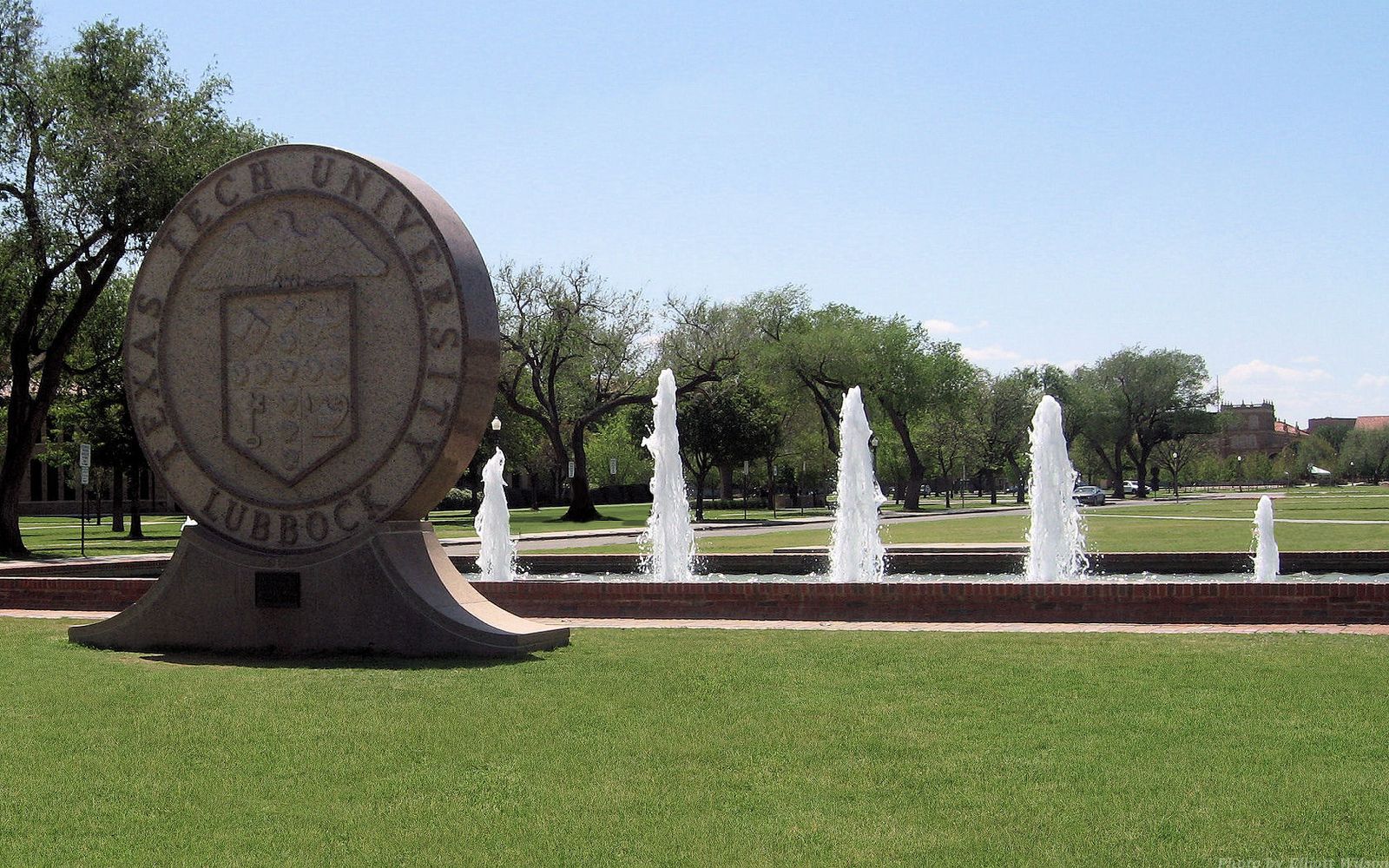 Texas Tech University seal and fountains at the campus entrance in Lubbock