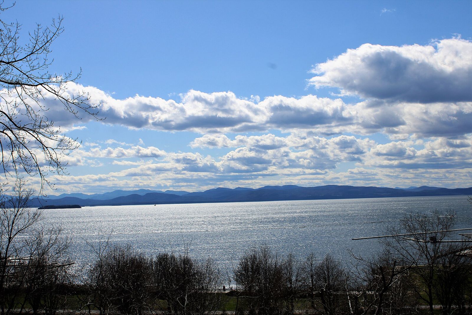 Lake Champlain and the Adirondack Mountains seen from the shore at Burlington