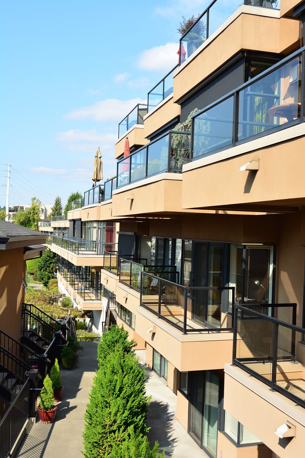 A row of modern townhomes in a Seattle neighborhood