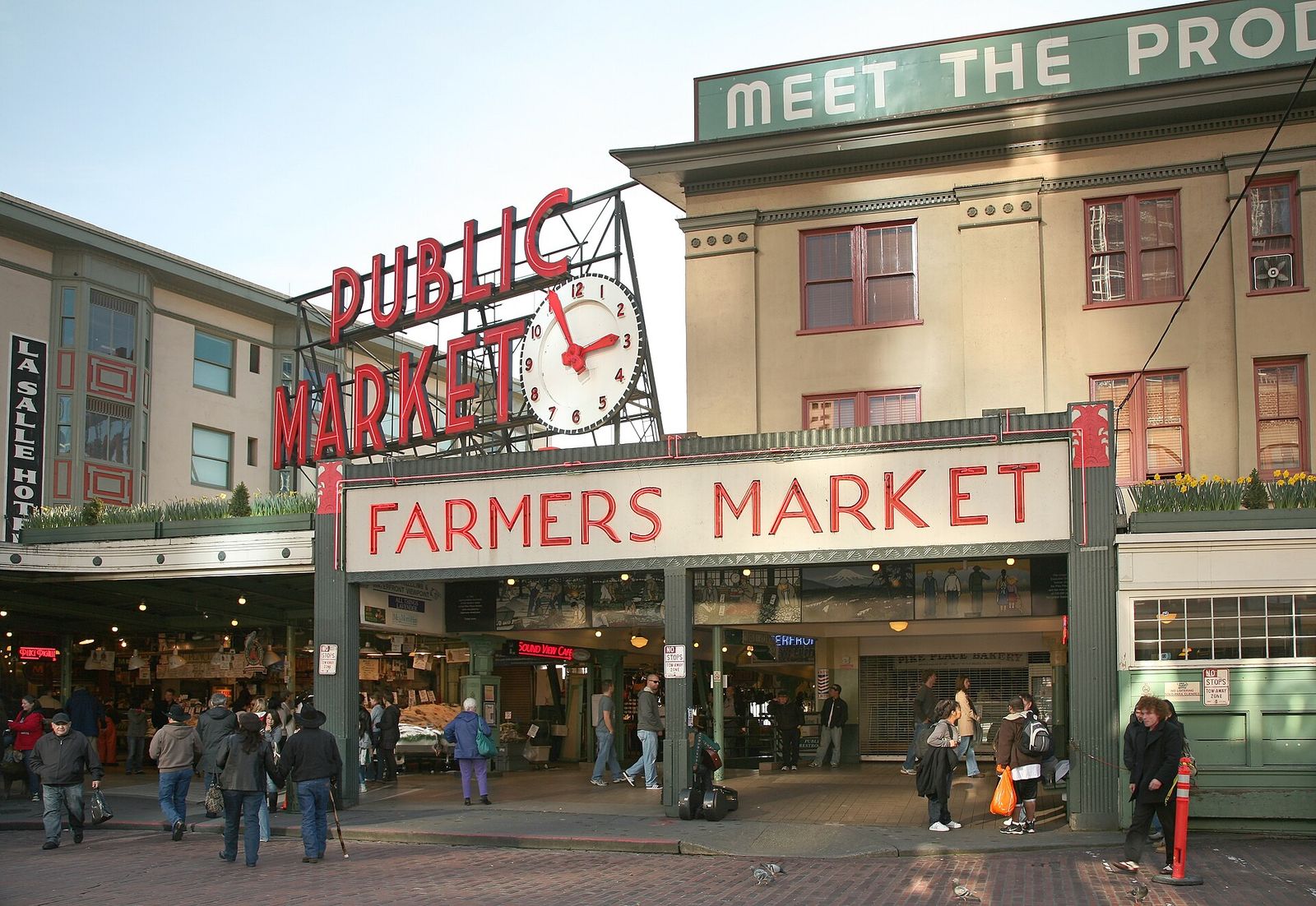 Crowds outside the Pike Place Market entrance in downtown Seattle