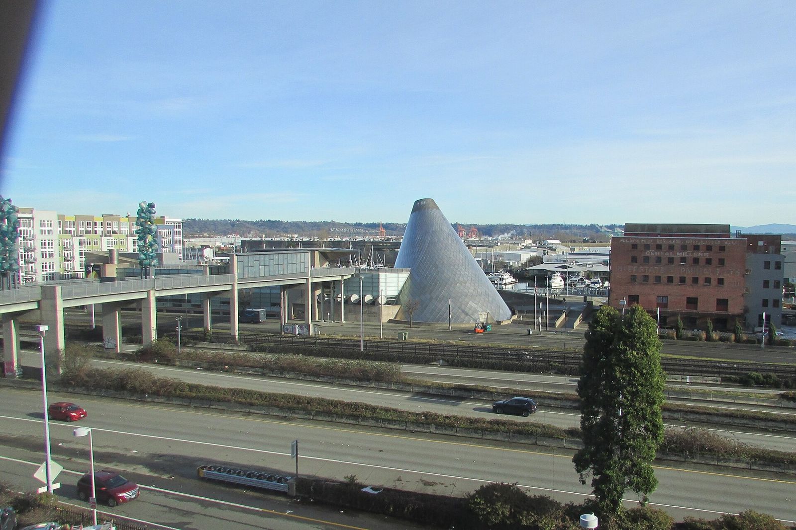 The steel cone of the Museum of Glass beside the Thea Foss Waterway in Tacoma