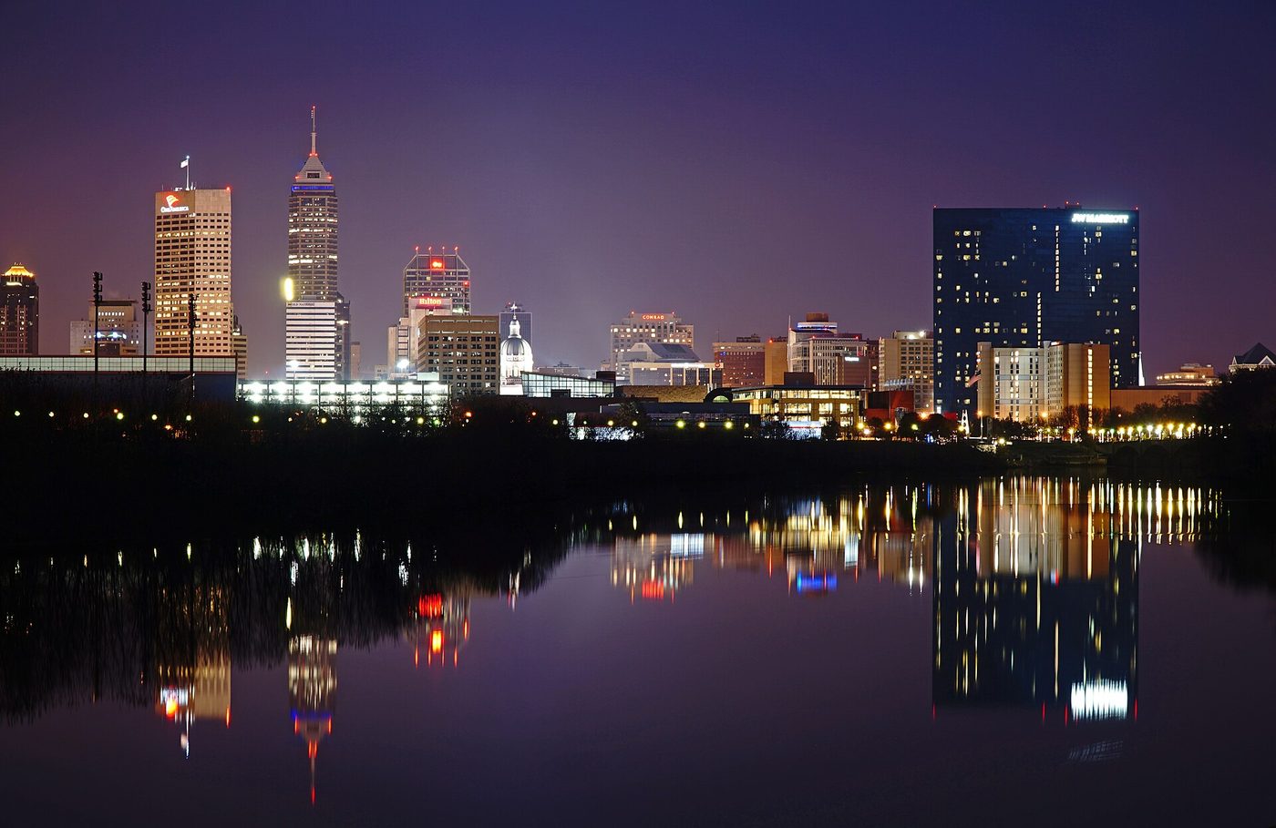 The Indianapolis skyline reflected in the canal at night