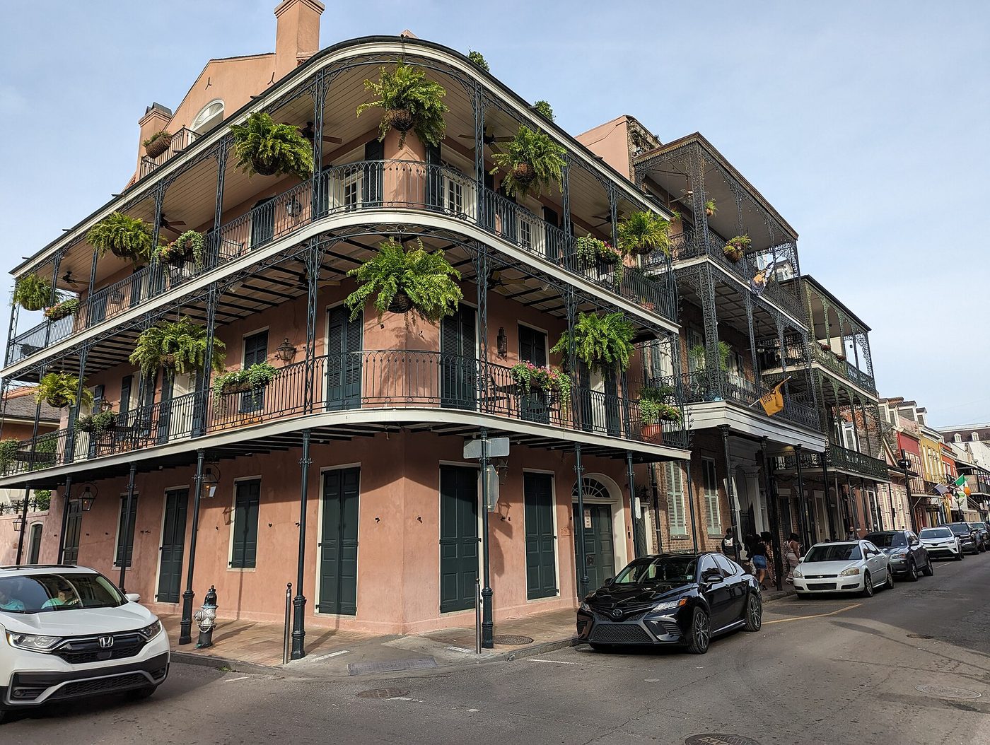 Cast-iron balconies on a corner building in the New Orleans French Quarter